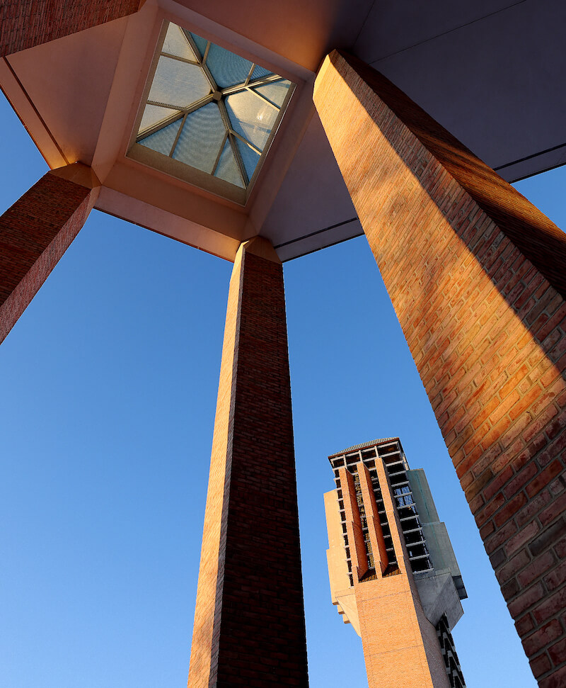Looking up at a skylight and tall columns of the Duderstadt Center